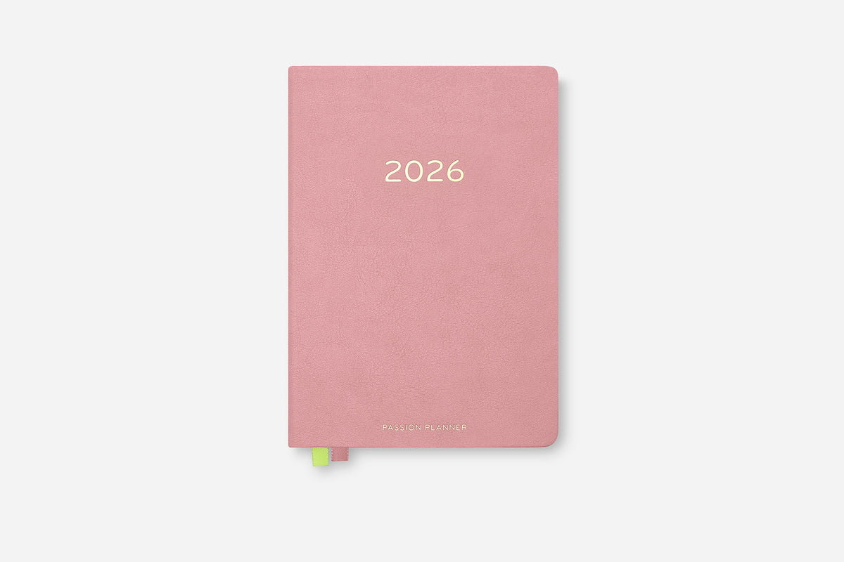 Pink planner with '2026' on a white background