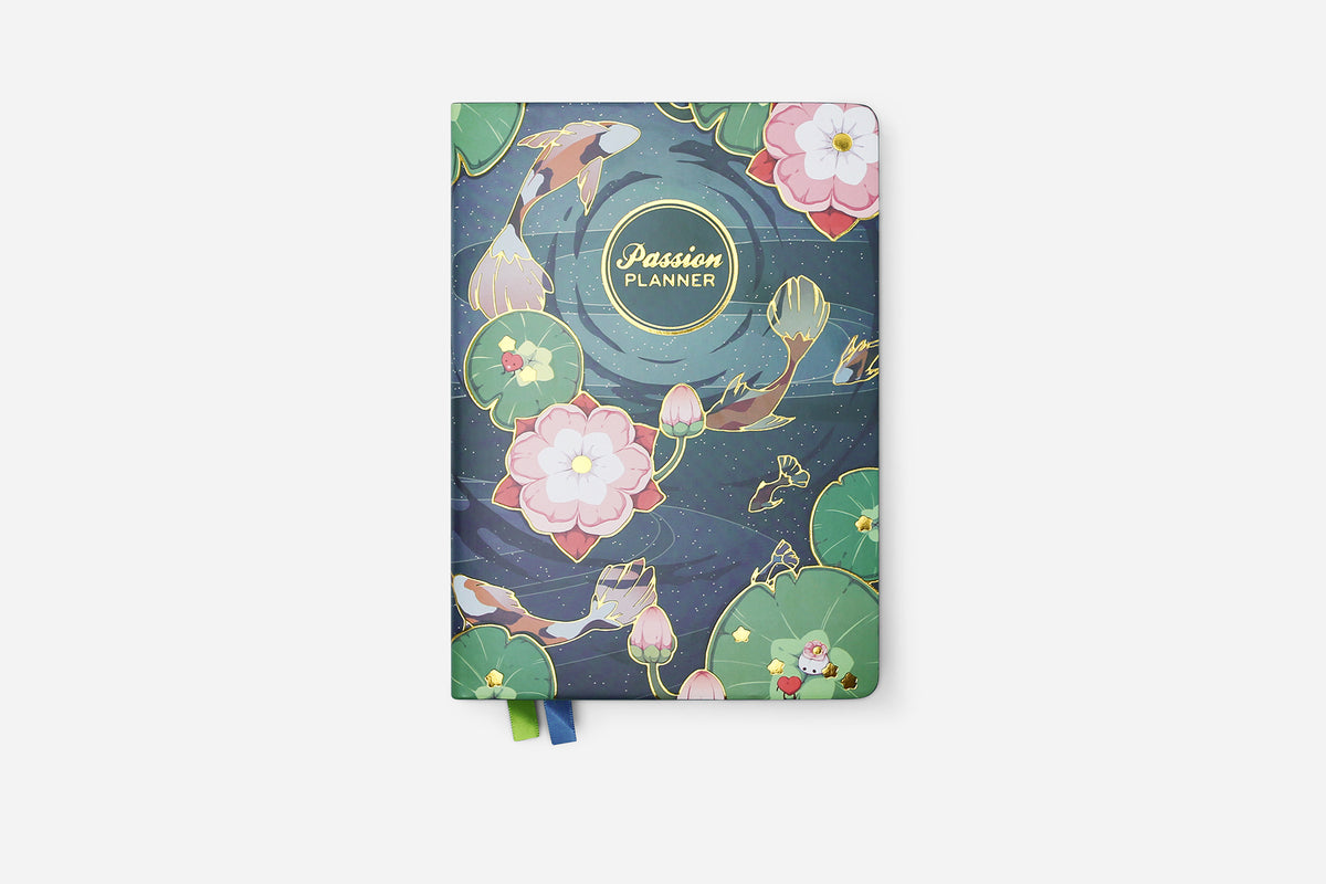 Planner with floral and koi fish design on a white background