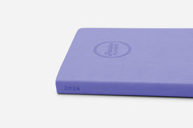 Purple planner with '2026' on a white background