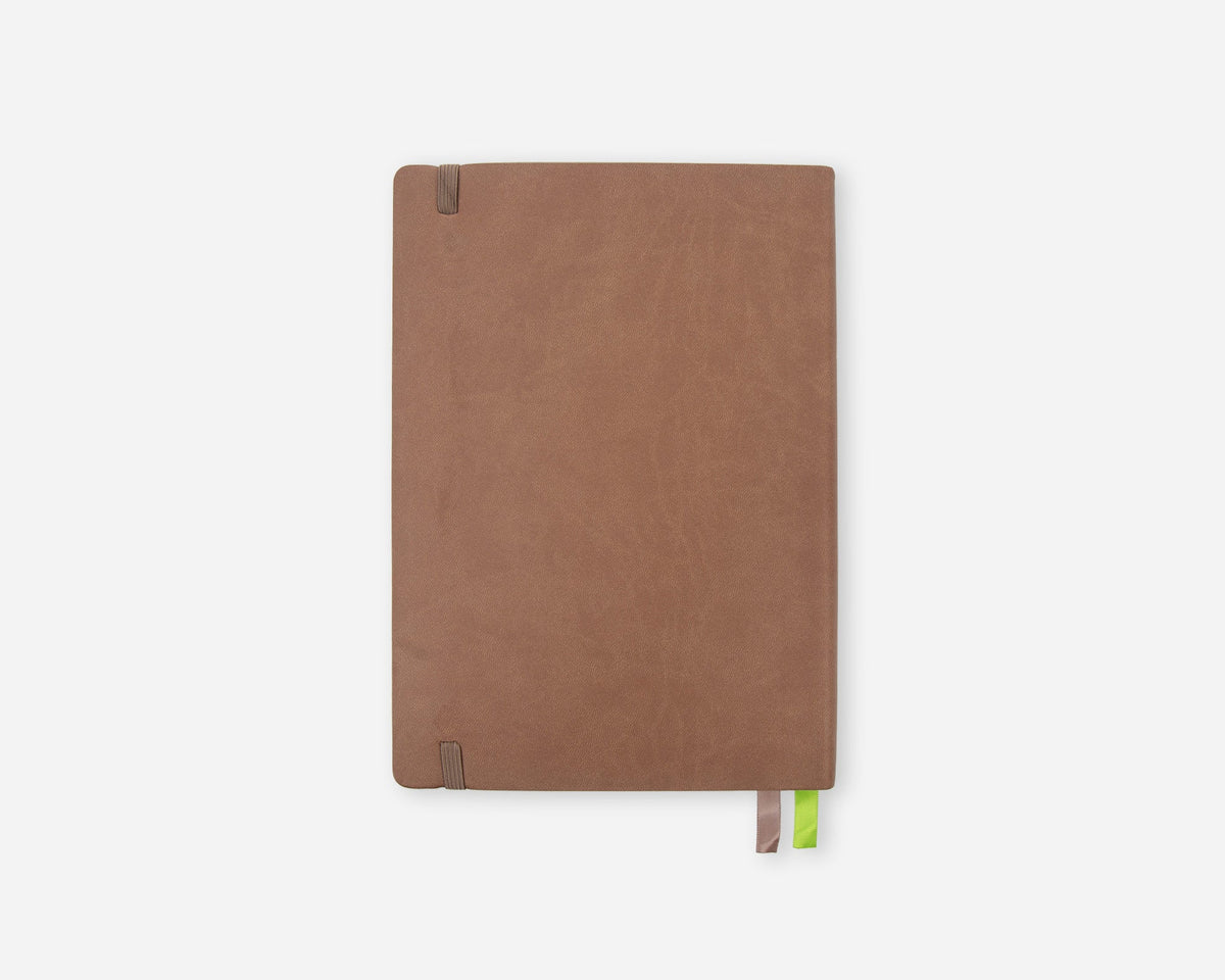 A brown faux leather planner cover with a small green bookmark ribbon peeking out from the bottom, shown on a light gray background.