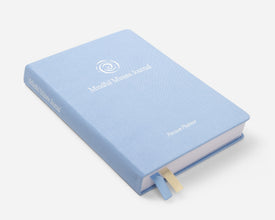 A light blue Mindful Minute Journal.