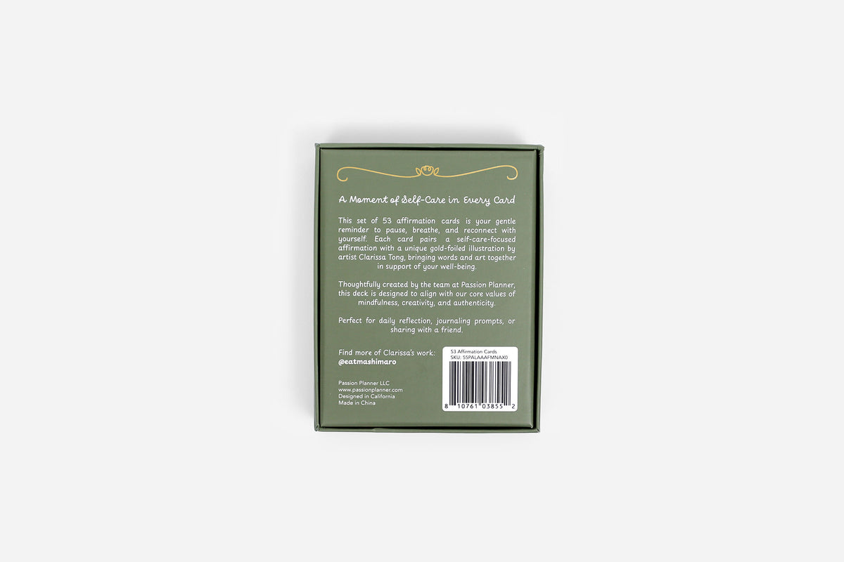 Back of affirmation card packaging with text and barcode on a light gray background